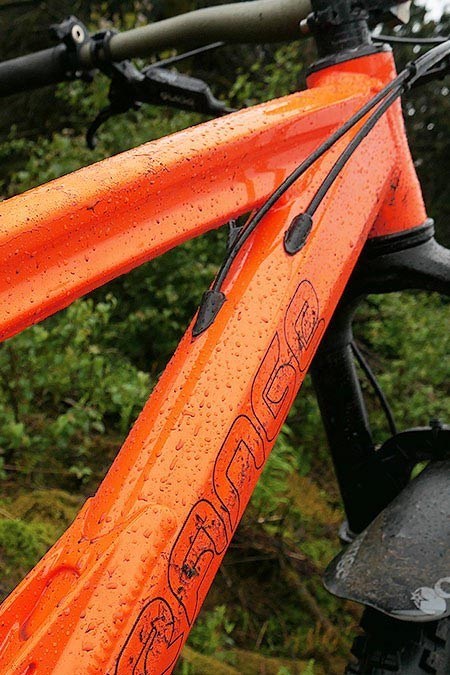 Side view showing the Orange name on the frame